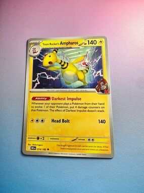 team rocket’s ampharos - 074/182 (uncommon) — pokemon: destined rivals